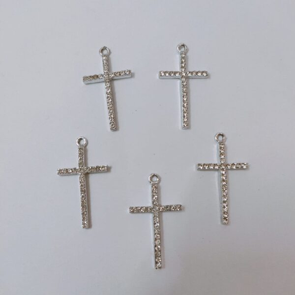 imported cross charm